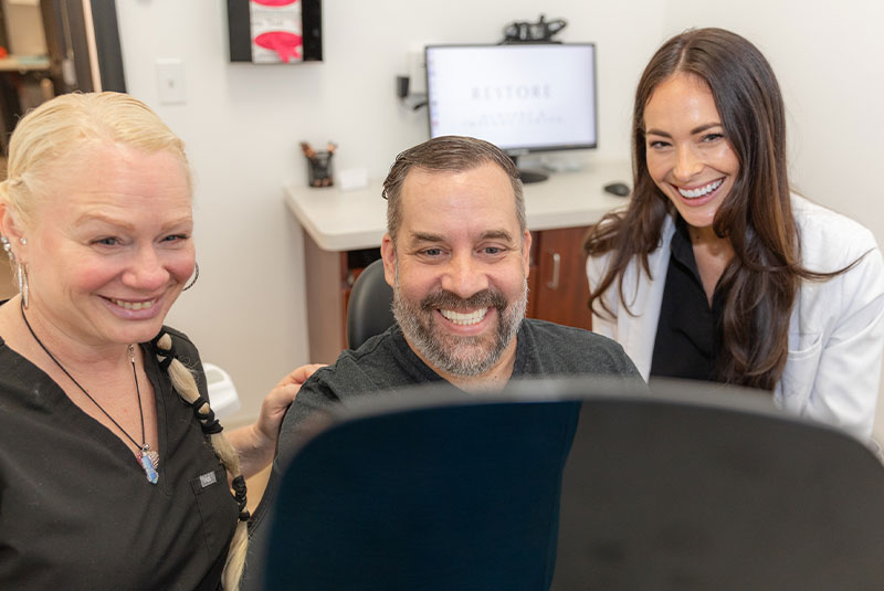 patient smiling after their dental procedure