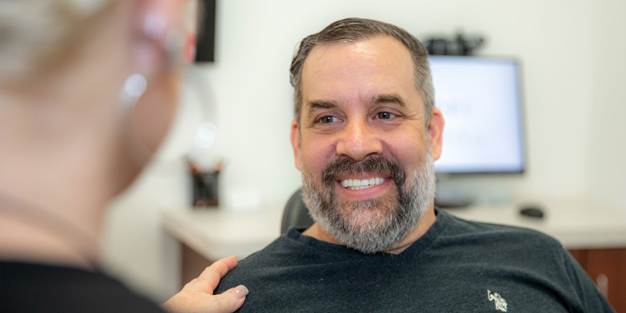 patient smiling after their dental procedure