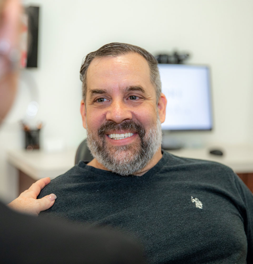 patient smiling after their dental procedure