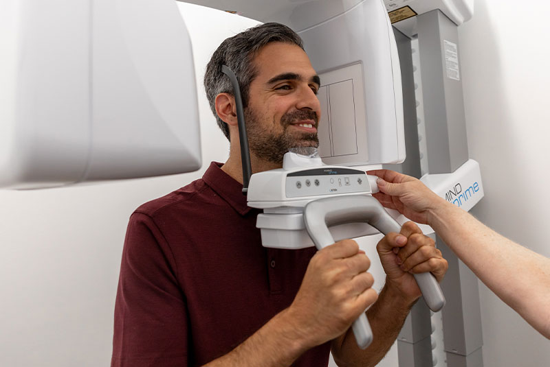 patient under going 3D scan for dental treatment