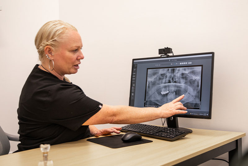 staff member going dental procedure information
