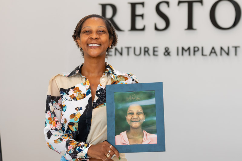 Dental Implant Patient Kayann Holding Her Before Image