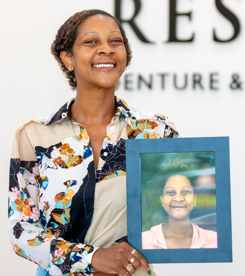 Dental Implant Patient Kayann Holding Her Before Image