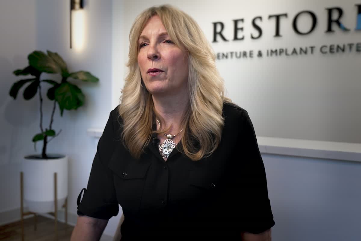 Karen, a Restore patient, sharing their dental implant story
