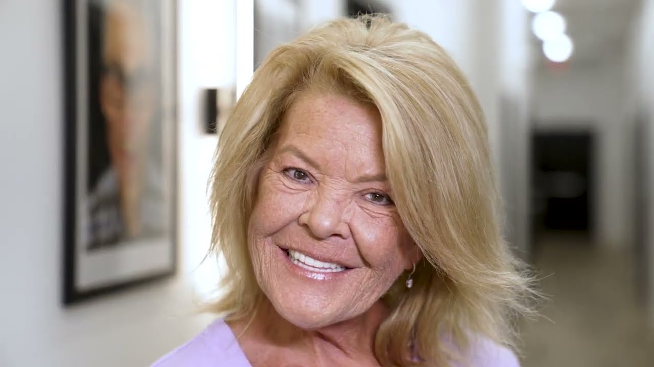 Restore Dental Implant Center patient smiling after full mouth dental implants